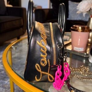 Black Leather and gold Christian Louboutin limited edition trash Handbag